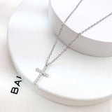 Sweet Magnolia Cross Necklace: Silver