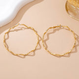 Making Waves Earrings: Gold