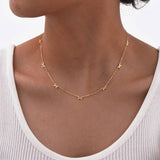 String of Bows Necklace: Gold