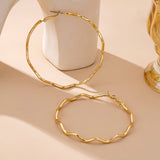 Making Waves Earrings: Gold