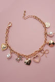 VALENTINA CHARM BRACELET: Gold