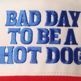 “Bad Day To Be A Hot Dog” Trucker Hat : Red