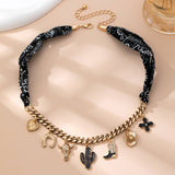 Saddle Up Charm Necklace: Black/Gold