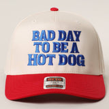 “Bad Day To Be A Hot Dog” Trucker Hat : Red