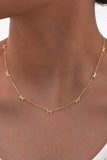 String of Bows Necklace: Gold