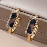 Gilded Glam Earrings: Gold