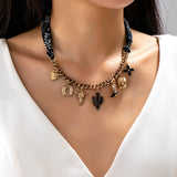 Saddle Up Charm Necklace: Black/Gold