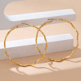 Making Waves Earrings: Gold